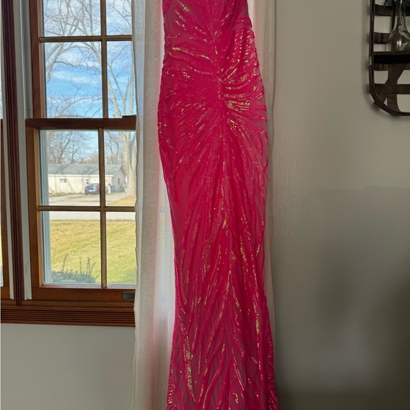 This prom dress is gorgeous! Hot pink…Size 2.. Jovani. - Picture 5 of 9